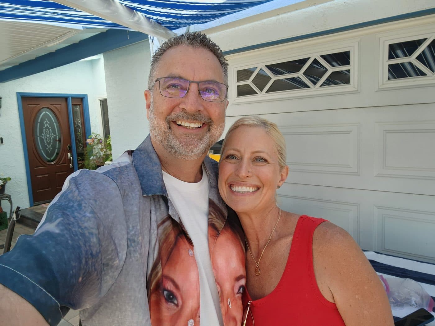 Fourth of July 2024. The face on the shirt is his sister Mary. His niece Cheryl is actually in the photo — yes, a real human being is standing right there. Please look at her. He made the shirt himself. This is not considered unusual.